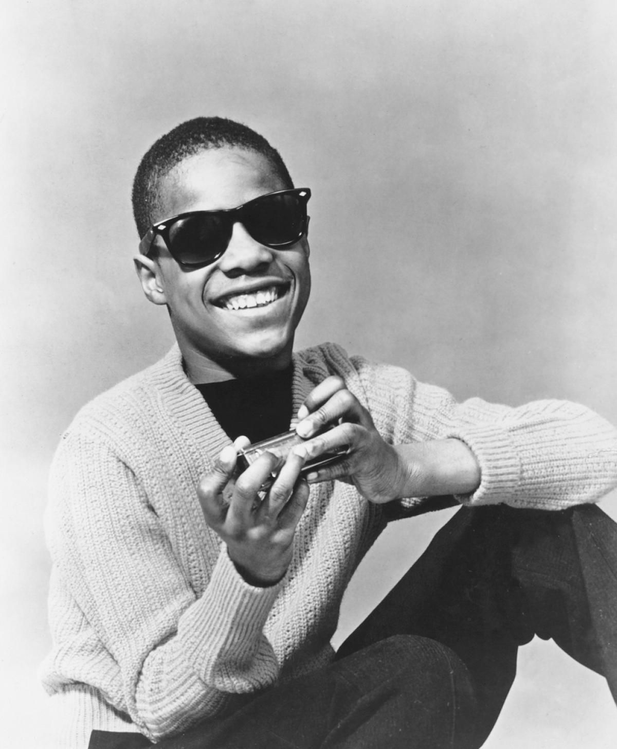A young Stevie Wonder posed with his harmonica circa 1960. At 11-years - How Old Is Stevie Wonder? Music Icon’s Age in 2025