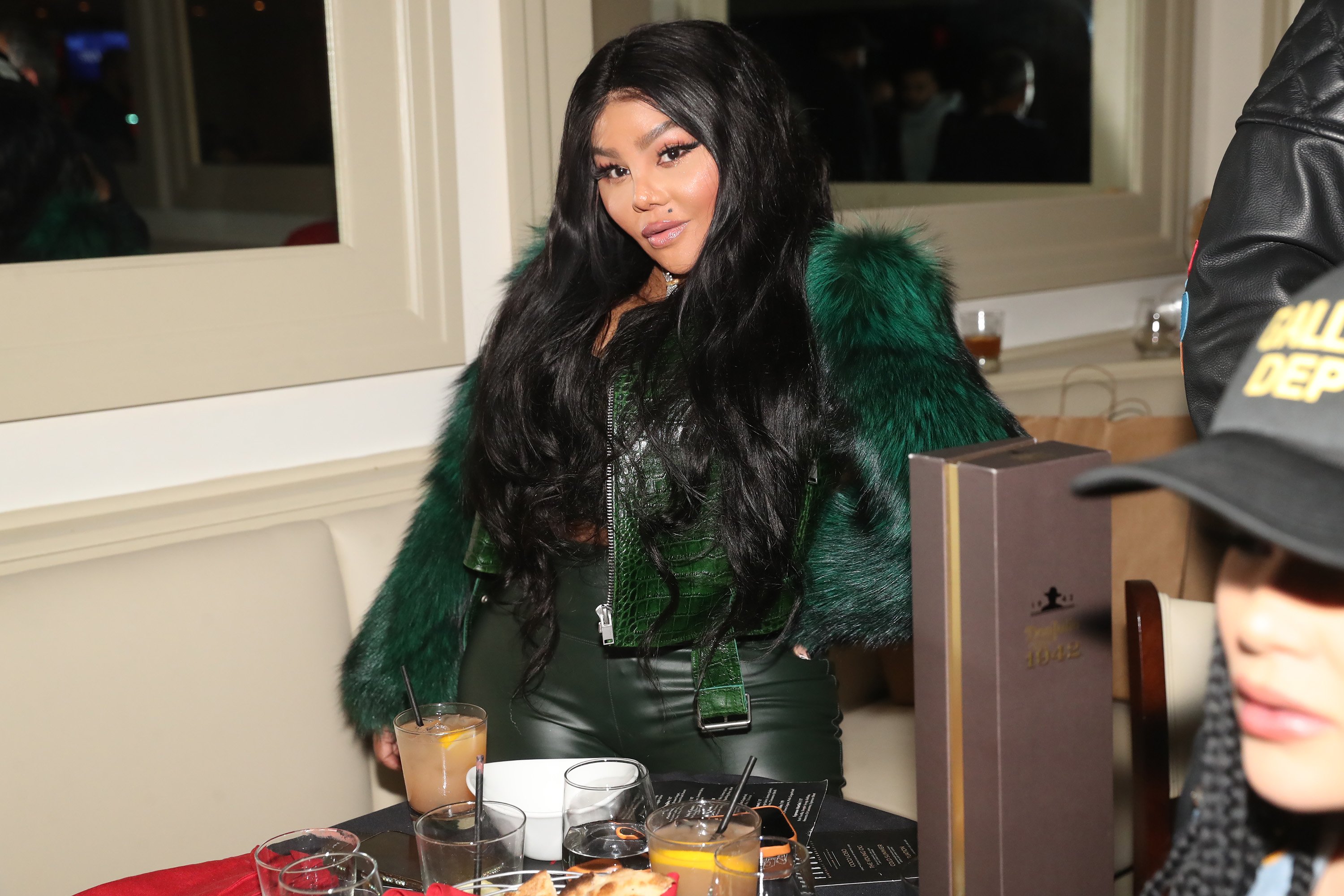 How Tall is Lil' Kim? - Lil' Kim Height – Rap Icon’s Petite Power
