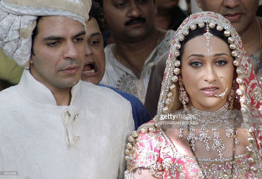 Indian film actress Karishma Kapoor (R) and her new husband Sanjay - Who Is Karisma Kapoor’s Husband? Meet Sanjay Kapur, the Businessman She Divorced