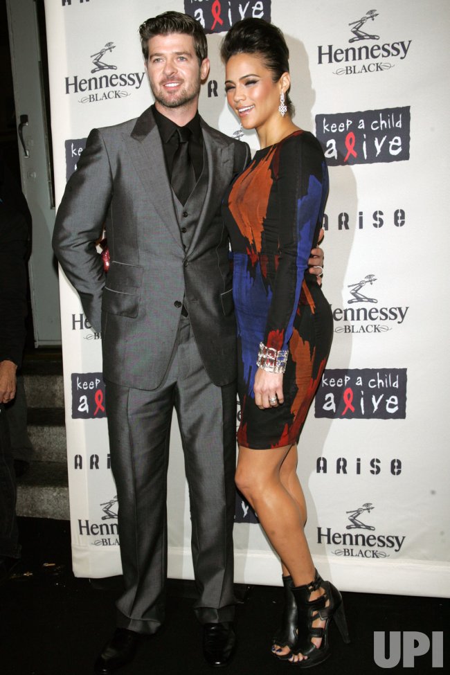 Photo: Paula Patton and husband Robin Thicke arrive at the Keep a Child - Who Is Paula Patton’s Husband? Meet Robin Thicke — Her Ex and Childhood Sweetheart
