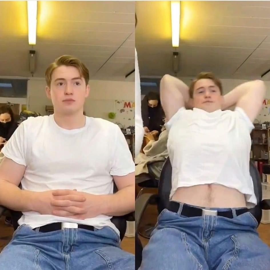 two people sitting in chairs with their hands behind their backs - Kit Connor’s Height: Heartstopper’s Breakout Star Revealed
